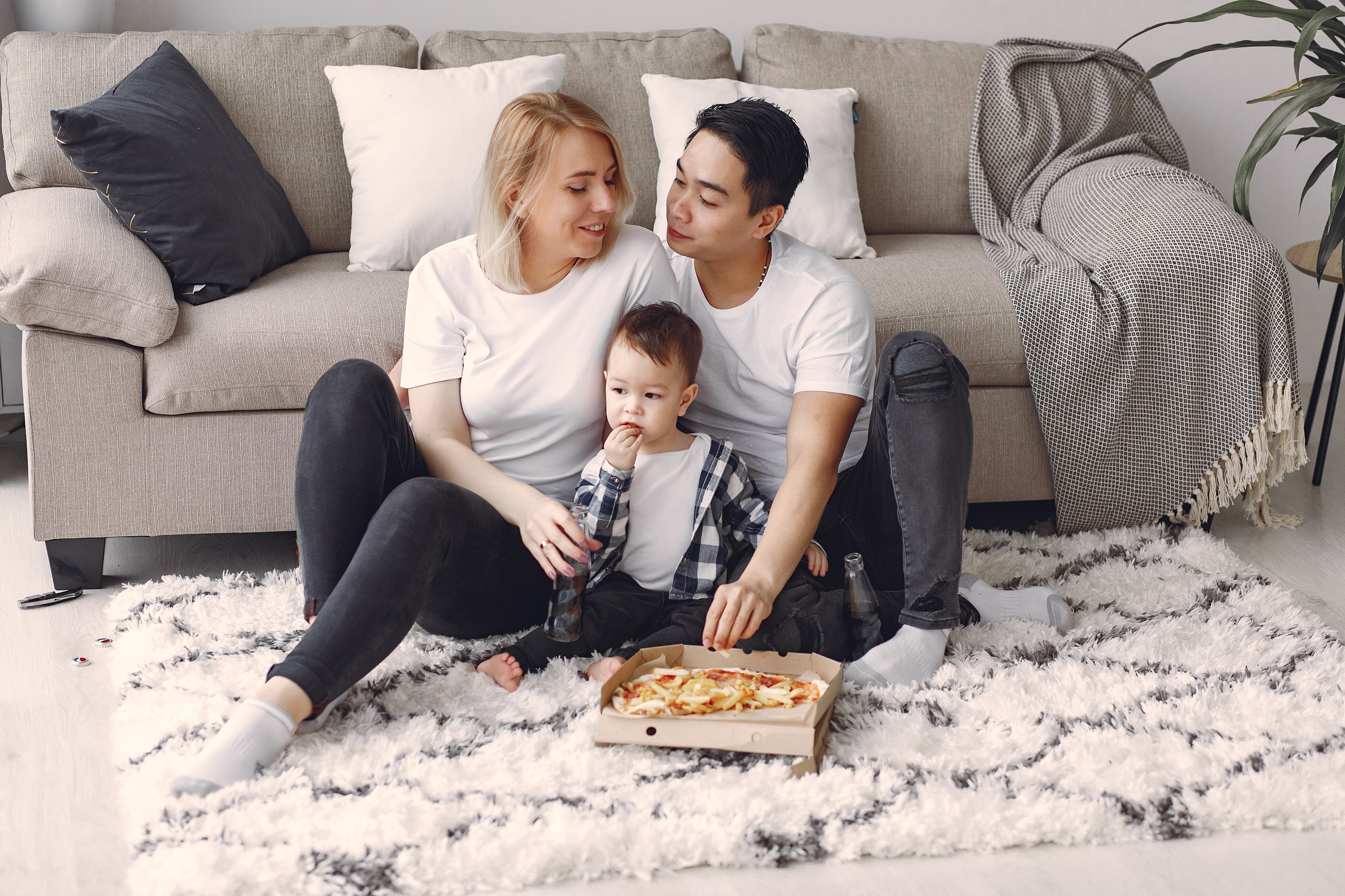 Canva - Family Eating Pizza